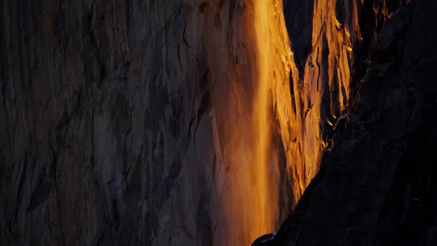 Close tilt up of firefall event in Yosemite National Park's Horsetail Falls.