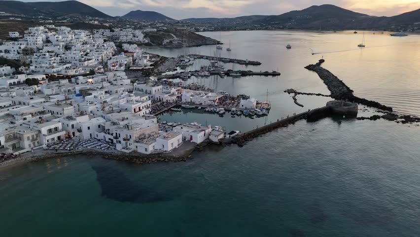 Paros Island,Aerial birds eye view,pan right from Naoussa town towards ancient Venetian castle