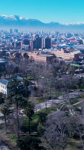 Aerial landscape of Santiago Chile near Andes Mountains. Touristic landmark. City life scenery Santiago Chile. Travel destinations. Vacations travel. Cityscape of Santiago Chile.