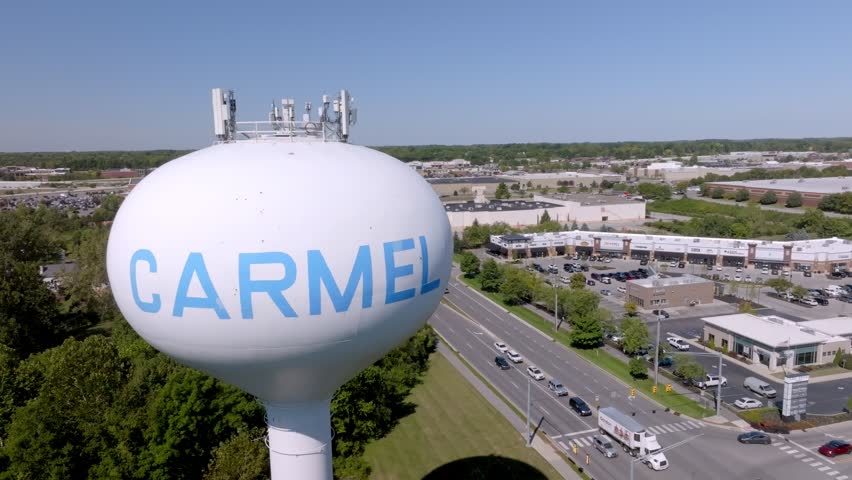 Carmel, Indiana water tower with stable drone video.