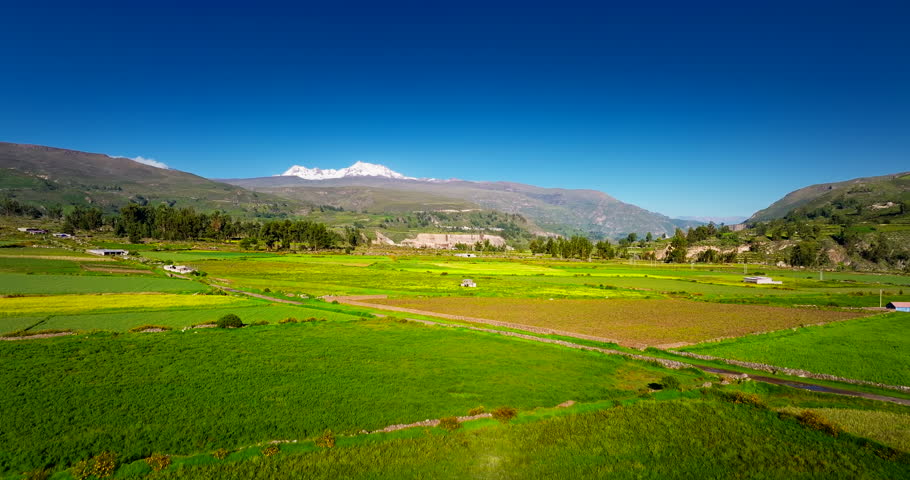 Verdant green patchwork agricultural landscape of Colca Canyon, Chivay. Aerial