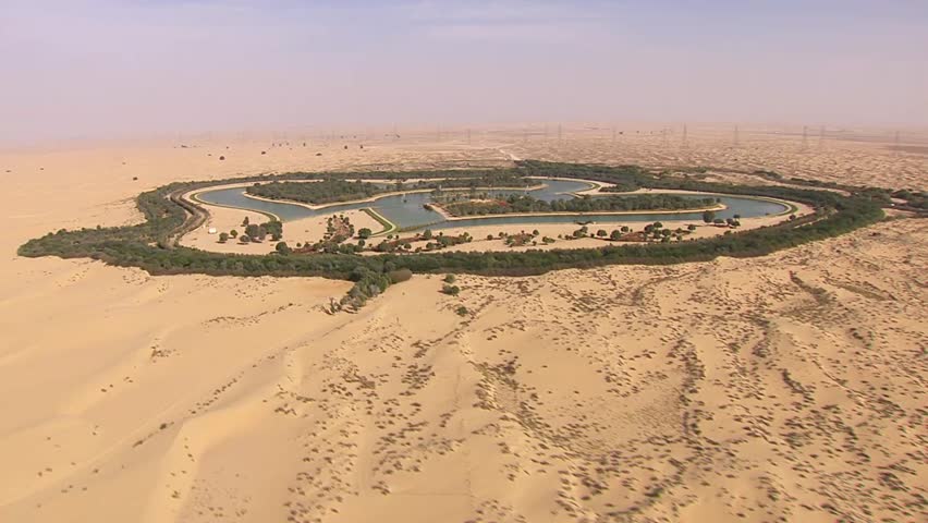 aerial view of man made lake in a heartshape middle of the desert