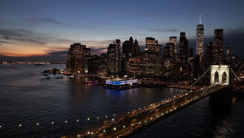 Brooklyn Bridge At Manhattan In New York United States. Illuminated Downtown. Sunset City Landscape. Brooklyn Bridge At New York United States. Brooklyn Bridge.