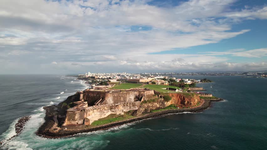 Viejo San Juan with Castillo San Felipe del Morro, Puerto Rico, high 4K drone shot.