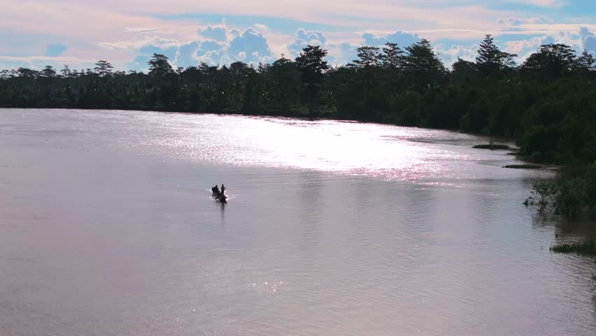 Wame River Gulf Province outrigger canoe boats Papua New Guinea PNG Papua Niugini aerial drone Karurua Ara