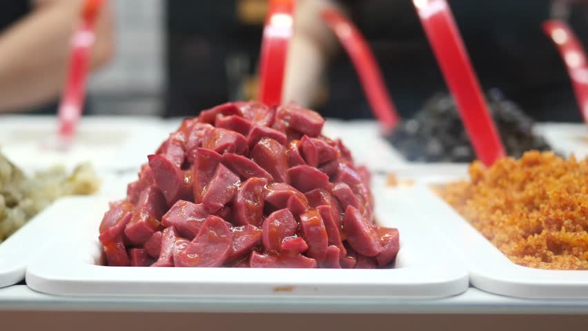 Delicious meat preparation at busy food market in downtown