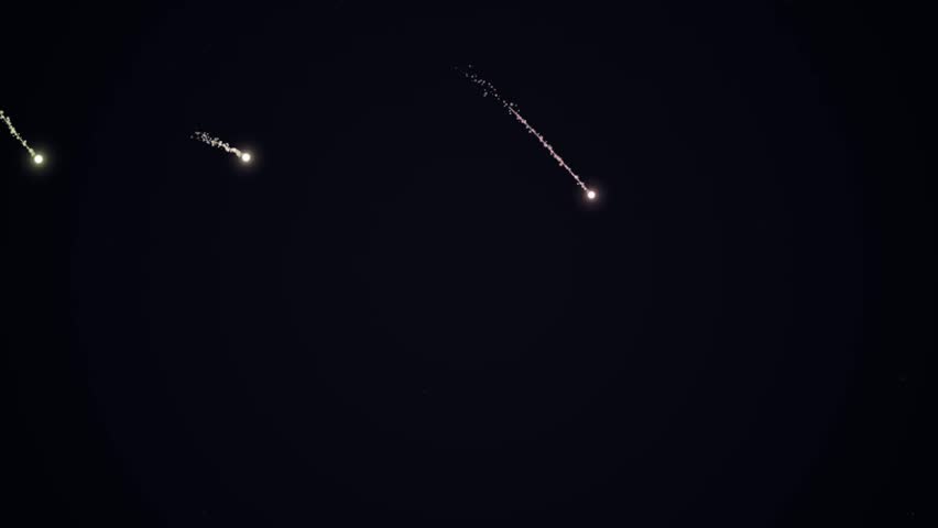 Shooting Stars in Dark Night Sky