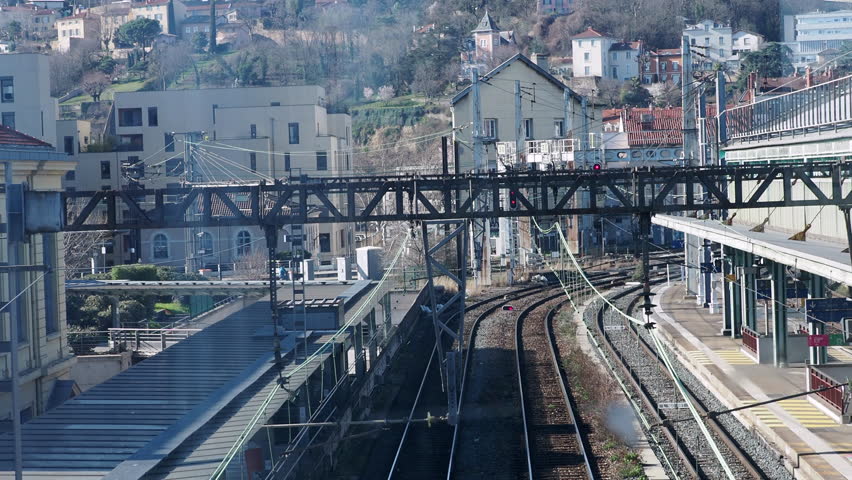Platforms of the Lyon Perrache station while waiting for the departure of a train in Lyon, France on a winter afternoon 