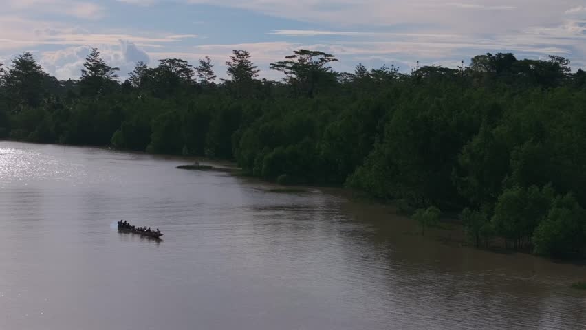 Purari Wame River Gulf Province outrigger canoe fishing Papua New Guinea PNG Papua Niugini aerial drone Karurua Ara