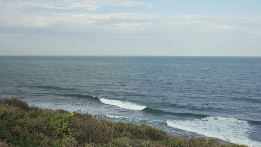People Surfing At Winkipop Surf Break At Bells Beach Near Torquay In Victoria, Australia.