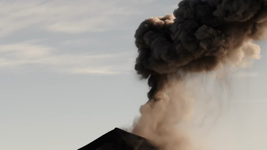 Aerial close view of towering ash column at Fuego volcano in Guatemala