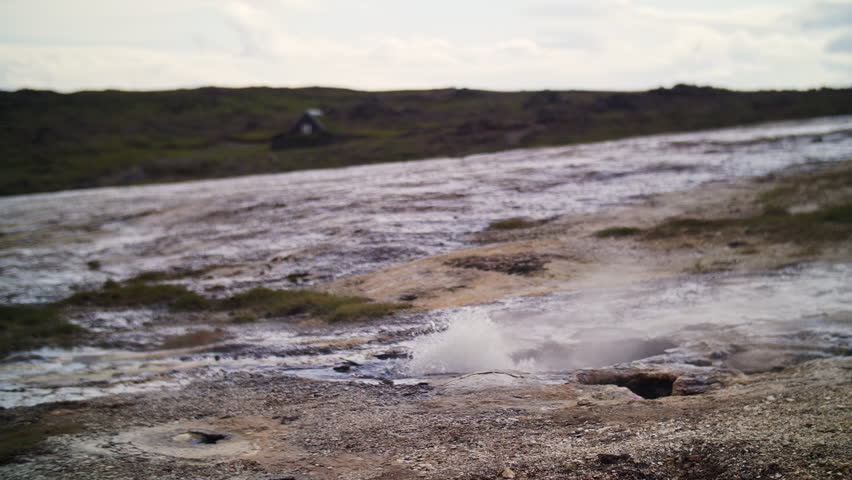 Geothermal Hot Spring with Steam and Mineral Crust in Iceland