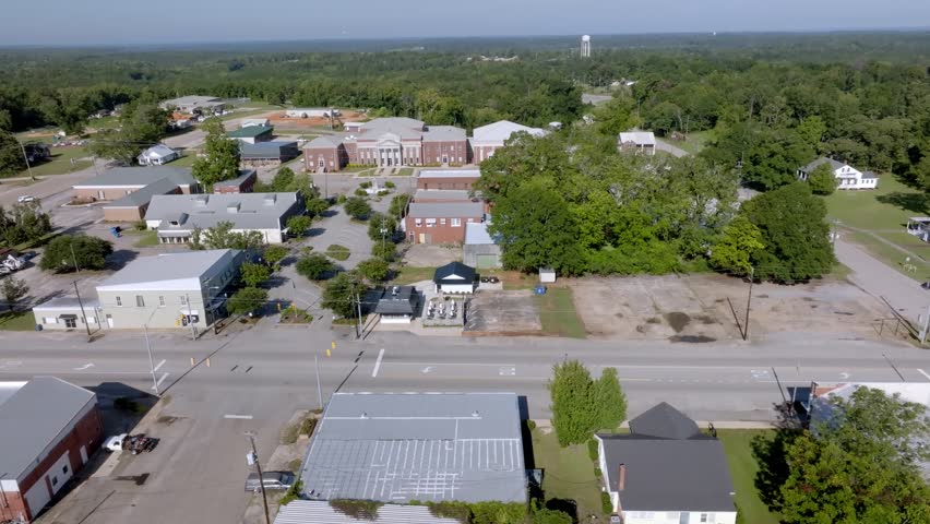 Downtown Grove Hill, Alabama with drone video moving in a circle.
