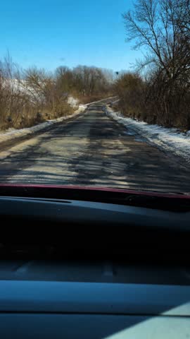Video road and snow-covered trees