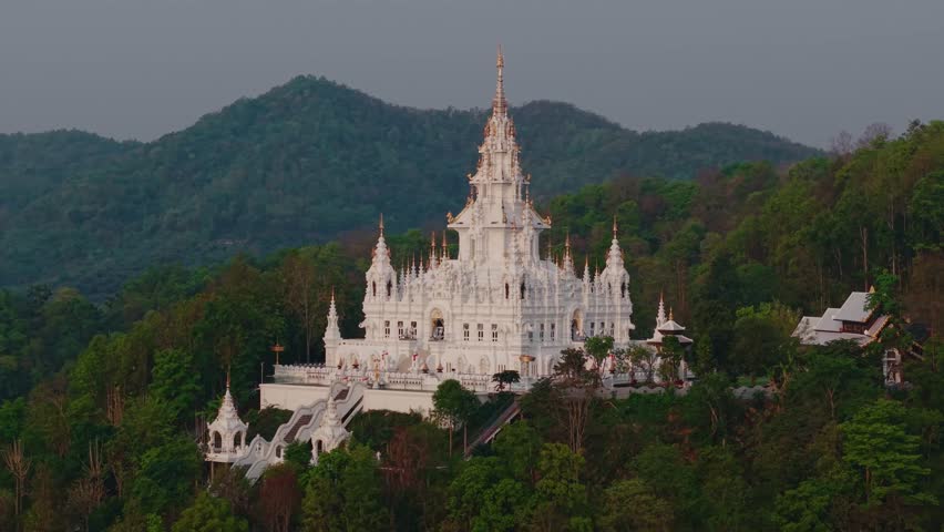 Aerial view White pagoda Loha Prasat Sri Mueang Pong temple in Chiang Mai, Thailand.