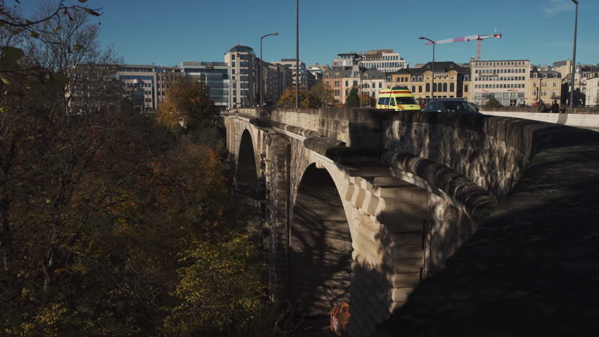 Luxembourg city, Luxembourg - sep 1 2025 Adolphe Bridge provides a one-way route for road traffic across the Petrusse, from Boulevard Royal, in Ville Haute, to Avenue de la Liberte in Gare. 