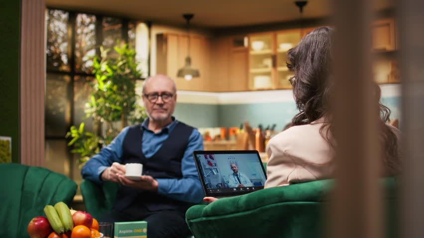 Aged people attending online medical consultation with medic via tablet. Telehealth checkup with physician providing medical advice and treatment for vitality and wellness, virtual connection.