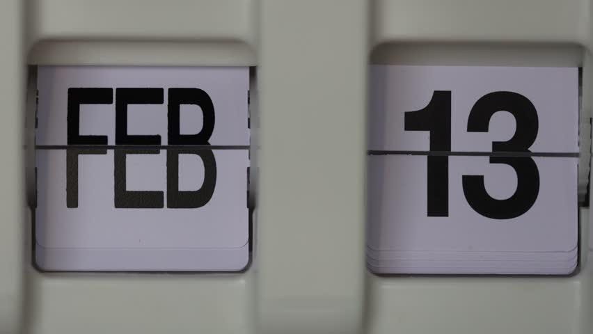 valentine's day | feb 13 to 14 vintage flip calendar date change | month and date in black letters on white background