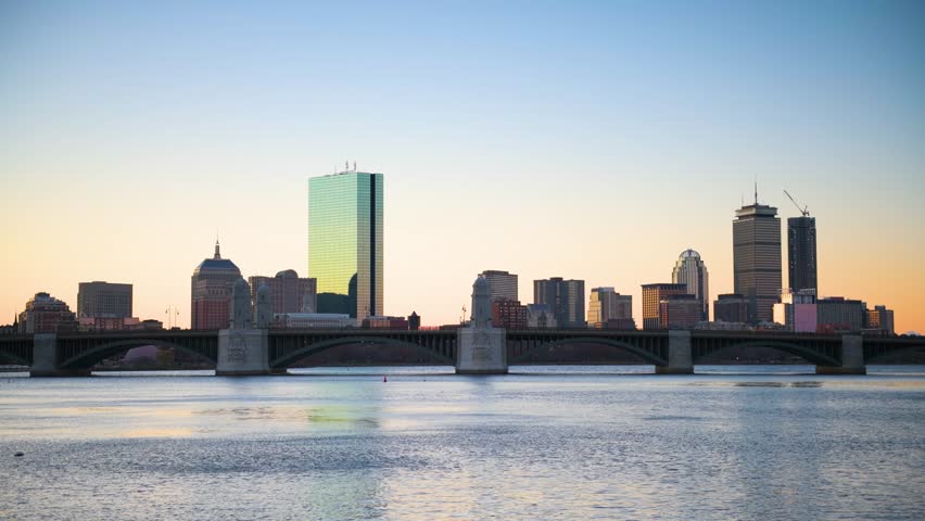 Boston, Massachusetts, USA downtown cityscape from across the Charles River at dawn.