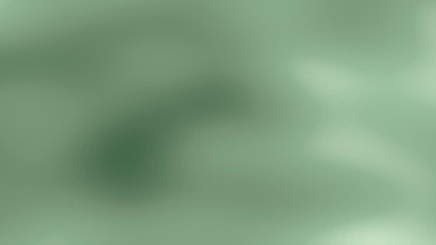 An undefined green abstract scene with soft motion and gentle lighting creating a calm and dreamy mood in a blurred setting