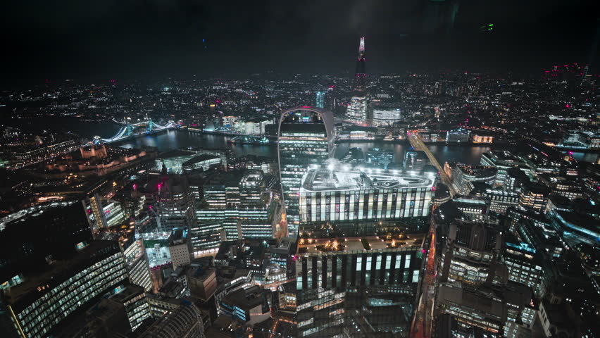 Night view of London skyline from high above, showcasing city lights