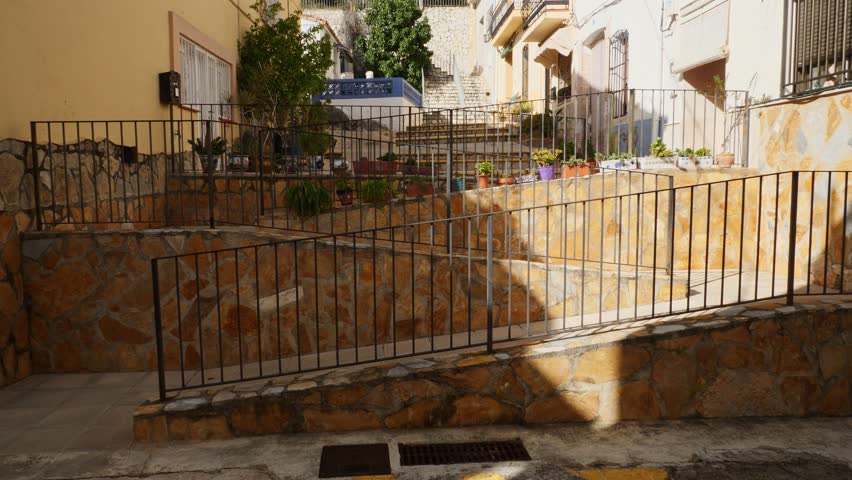 Stairs in the center of the village of Sagra, Spain, on a sunny day