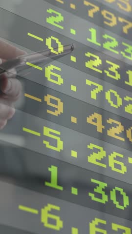Vertical video: Trader tapping tablet and swiping pen causing market ticker while viewing stocks. Finance, analytics, data, numbers, overlay, executive, vertical video