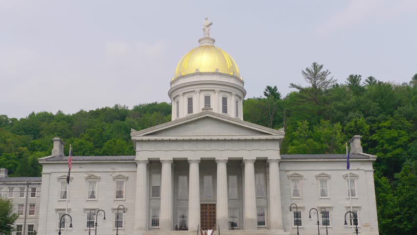 Vermont State House with its iconic gold dome and Greek Revival architecture under a soft sky, Montpelier, USA. 4k video.