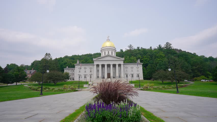 Vermont State House with its iconic gold dome and Greek Revival architecture under a soft sky, Montpelier, USA. 4k video.