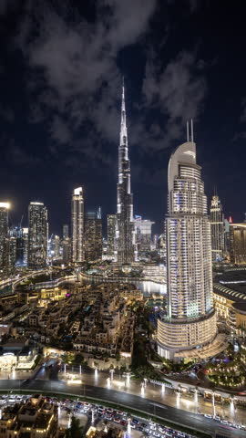Timelapse of the incredible dubai skyline from a unique high vantage point at night in vertical