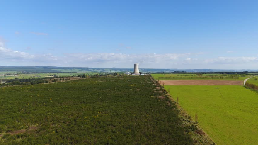 Distant upward drone fly of the geothermal Ohaaki Power Plant in Waikato region, New Zealand