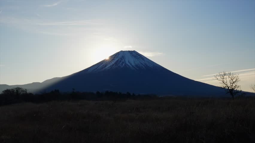 Timelapse of the Diamond Fuji effect in Japan. Sun rising over Mount Fuji.