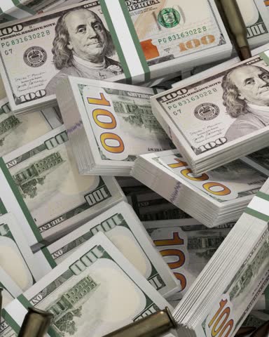 stack of  dollars and  bullets