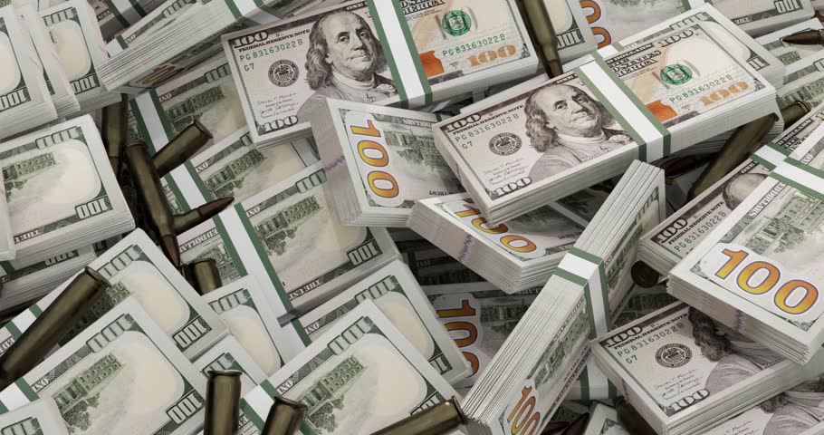 stack of  dollars and  bullets