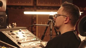 Producer Leads Project, Sound Engineer Manages Controls. Studio Production, Radio Broadcasting, Recording Studio. - Powered by Shutterstock - Get 15% off with code: PIKWIZARD15