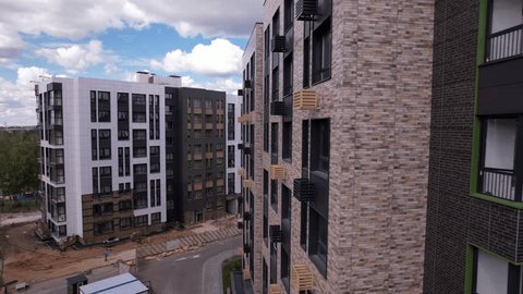 Aerial Rightward Motion near Apartment House Playground