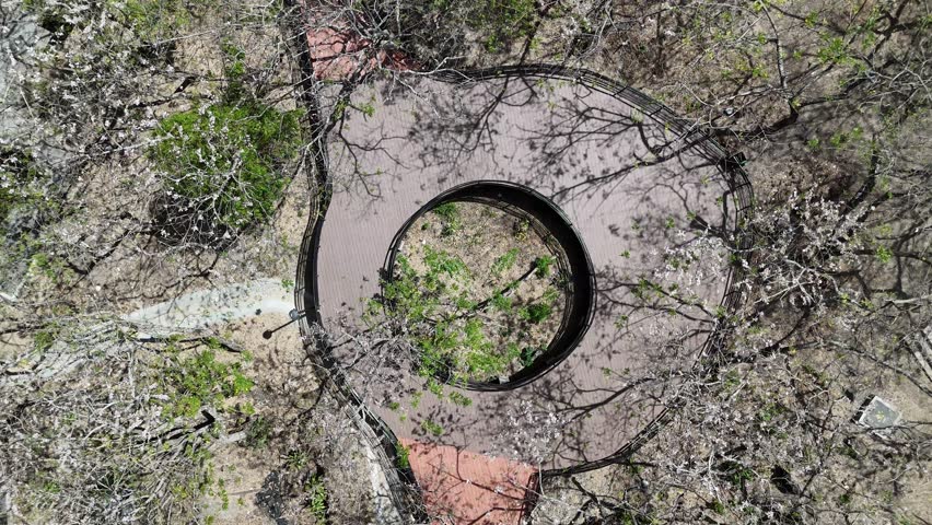 Aerial view of modern circular walkway in San Miguel Renovated public urban park, El Salvador