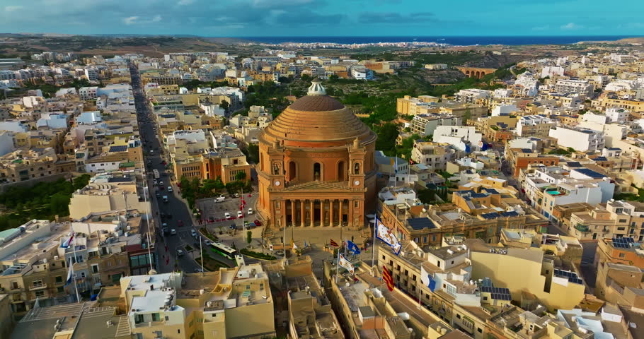 Aerial view of Mosta Church, famous remarkable wartime miracle, architectural landmarks, Malta 
