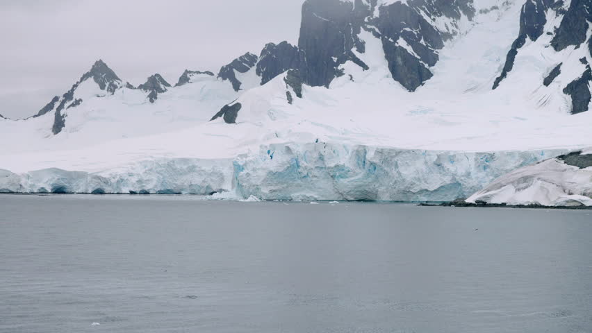 Scenic View Of Antarctic Iceberg Landscape At Portal Point, Antarctica. Slow Motion Shot