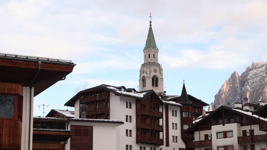 traditional architecture and church spire in the center of Cortina d