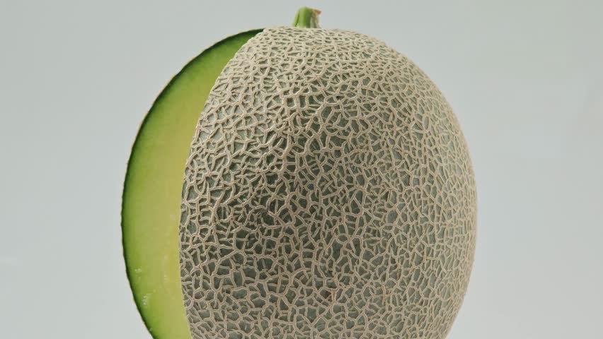 Close-up of a ripe green melon.
