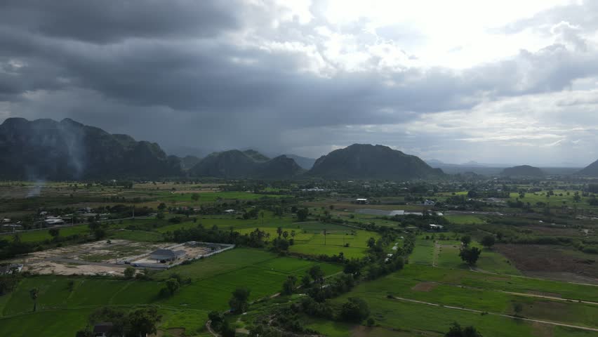 Aerial Drone Shot of Monsoon Storm and Heavy Rain Over Mountains in Cha-Am, Thailand