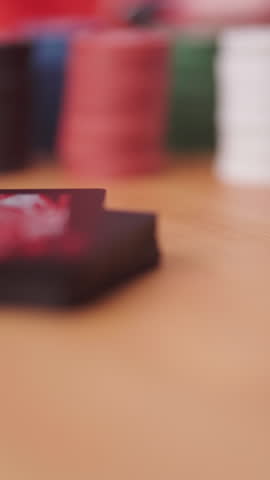Female in school girl cosplay play poker and throw betting chips on table