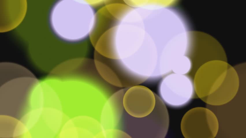 Animated sequence of colorful blurred circles on a black background