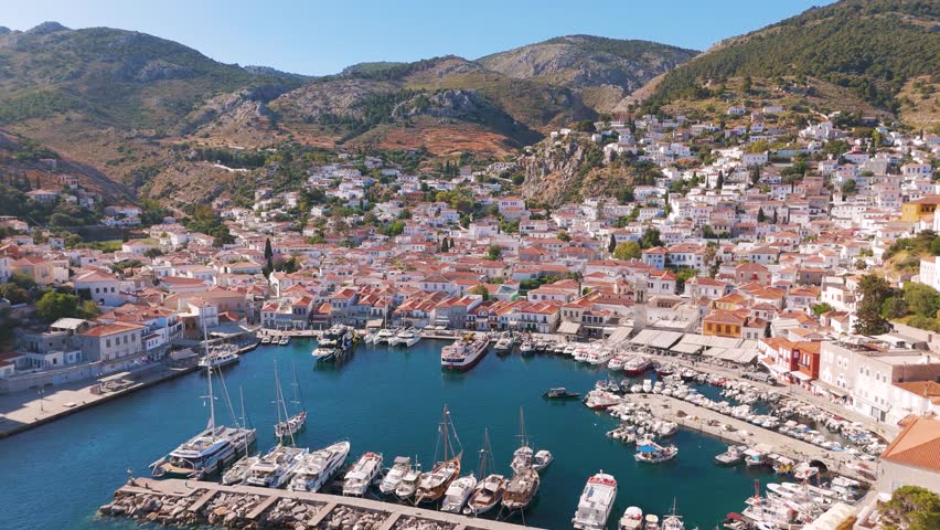Aerial view of Hydra harbor and charming hillside town in Greece