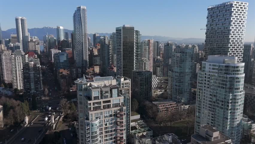 Cityscape With Numerous High-Rise Buildings And Skyscrapers In Downtown Vancouver, Canada. - aerial shot