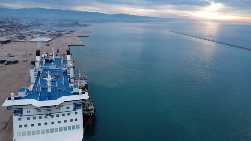 Bow of Large Ferry Anchored in Polluted Harbor Waters