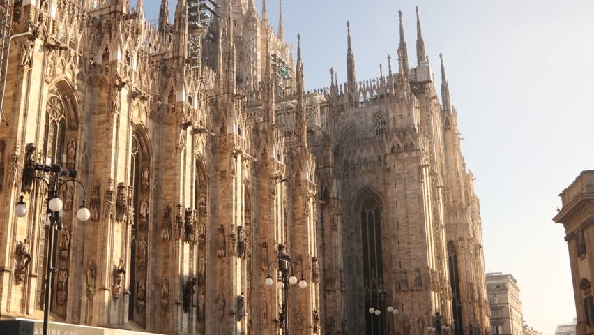 intricate marble spires and gothic architecture on top of the Milan Cathedral. Iconic landmark detail in Italy