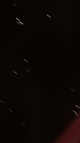 An abstract exploration of darkness punctuated by sparse light, creating a mysterious and intriguing visual experience.