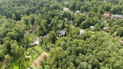 Drone Circling above Forest Settlement Mikhaylovo Yartsevskoye